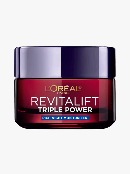 L’Oréal Paris Revitalift Triple Power Rich Night Moisturizer in branded component on a light gray background